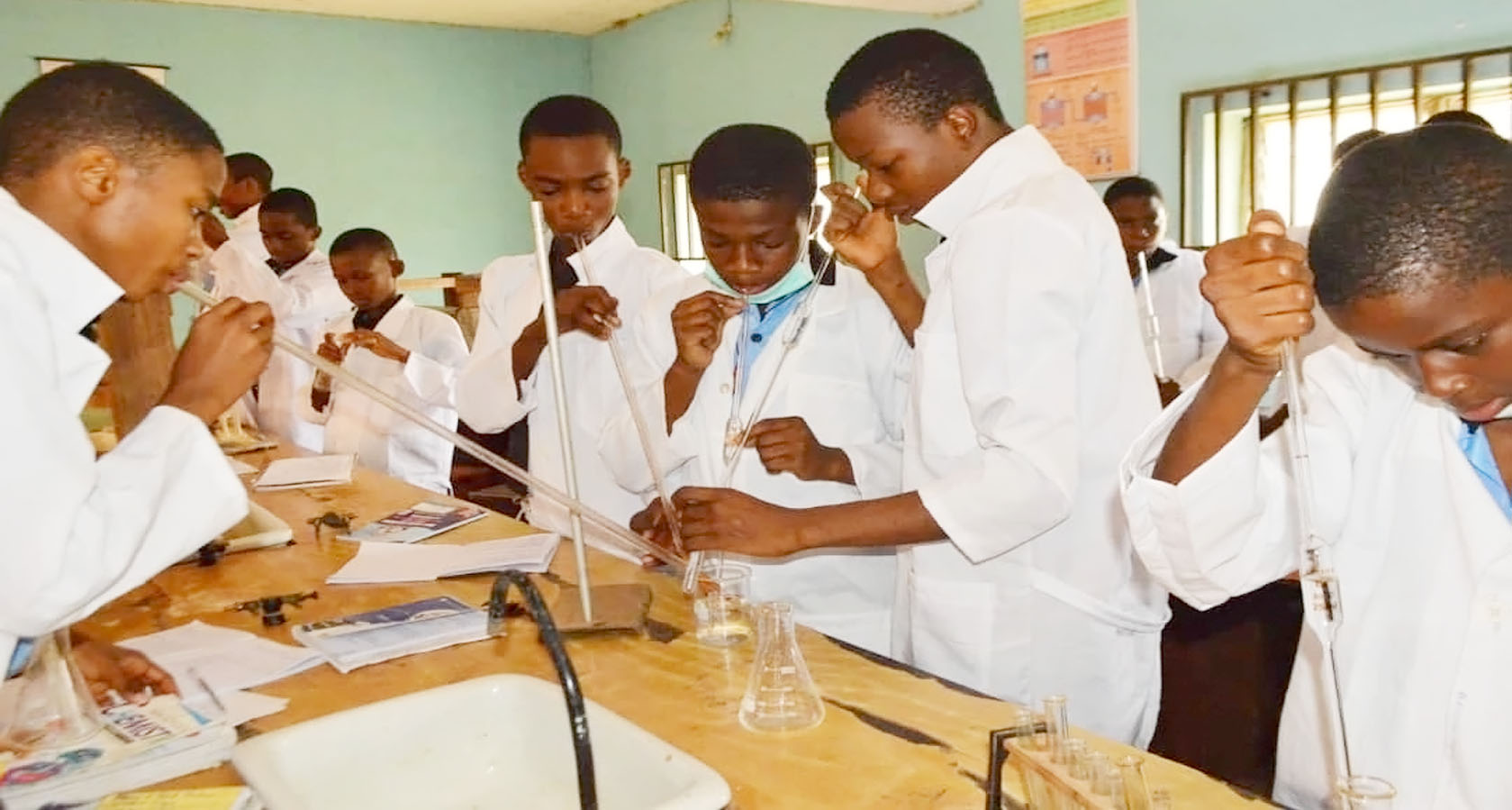Holy Ghost Academy students in science laboratory practical