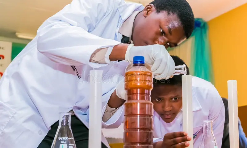 Petgas International School students performing science experiments