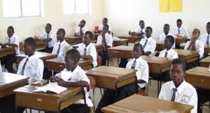 Government Model Secondary School students studying in a classroom in Makurdi.
