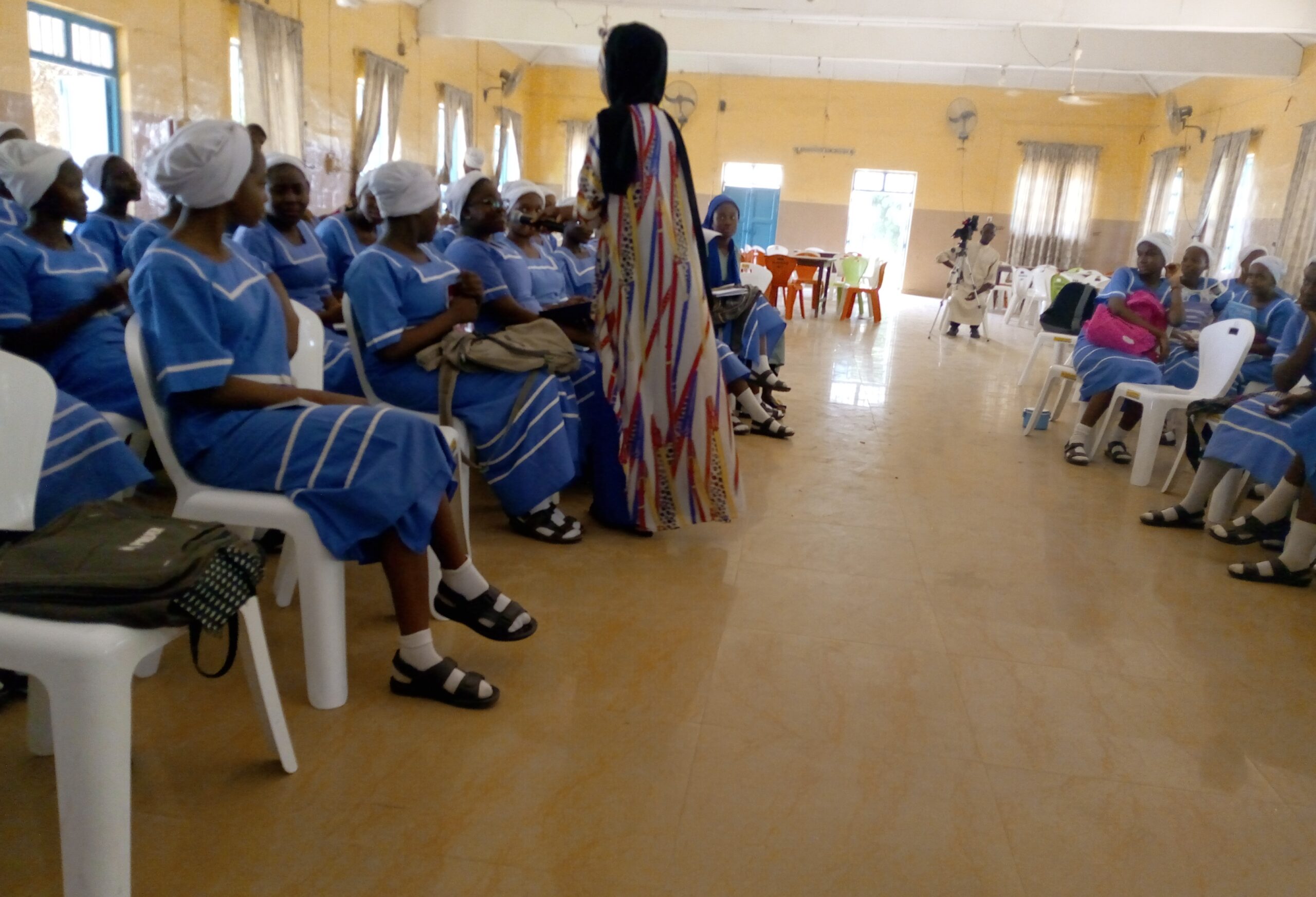 St. Louis Secondary School Kano students studying in classroom.