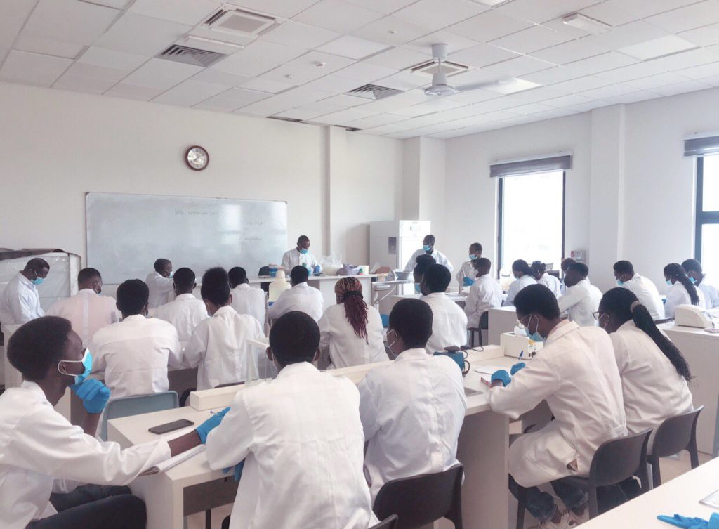 Greater Tomorrow International College students in a modern science lab