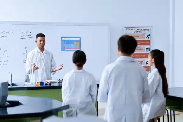 Corona Secondary School students performing science experiments